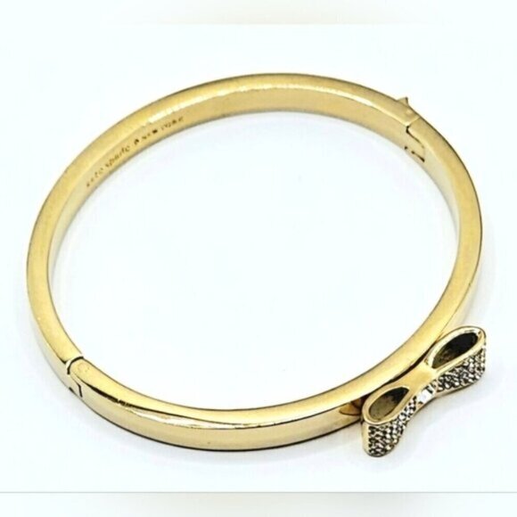 Kate Spade New York Gold-Tone Bow Bangle Bracelet with Crystals + Pouch - Picture 5 of 10